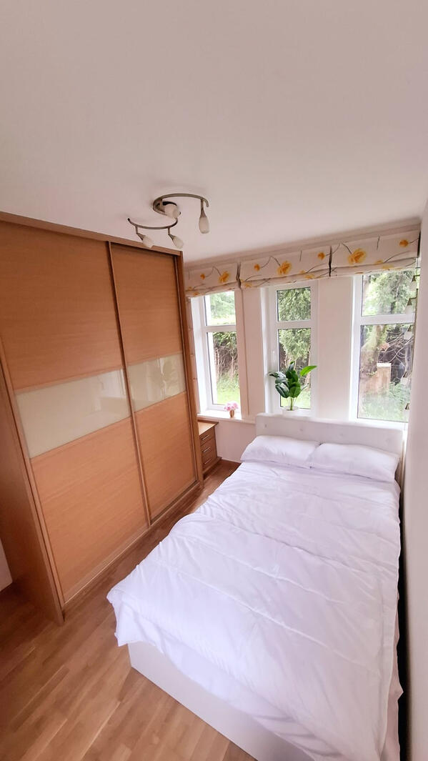 Bedroom with comfortable built in wardrobe and option to add a baby bed